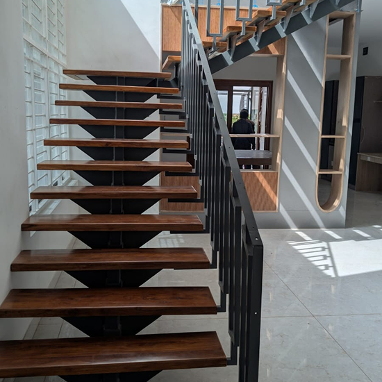 Stringer beam staircases